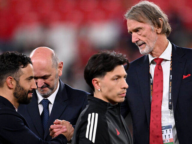BILBAO, SPAIN - MAY 21: Sir Jim Ratcliffe, Co-owner of Manchester United, shakes hands with Ruben Amorim, Manager of Manchester United, as he walks to the podium to collect his runners-up medal after the UEFA Europa League Final 2025 between Tottenham Hotspur and Manchester United at Estadio de San Mames on May 21, 2025 in Bilbao, Spain.