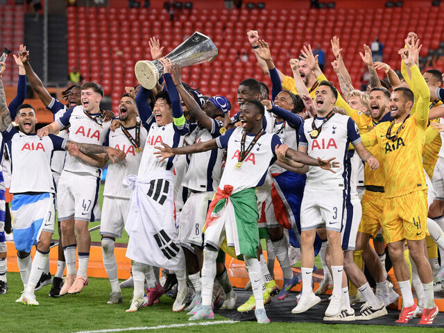 Tottenham Hotspur's South Korean forward #07 Son Heung-min raises the trophy as he celebrates with teammates winning the UEFA Europa League final football match between Tottenham Hotspur and Manchester United at San Mames stadium in Bilbao on May 21, 2025.