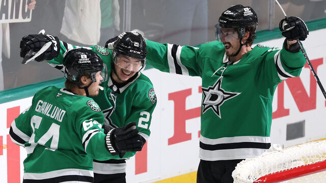 DALLAS, TEXAS - MAY 21: Mikael Granlund #64 of the Dallas Stars congratulated by Jason Robertson #21 and Mason Marchment #27 after scoring a goal against the Edmonton Oilers during the third period in Game One of the Western Conference Final of the 2025 Stanley Cup Playoffs at American Airlines Center on May 21, 2025 in Dallas, Texas.
