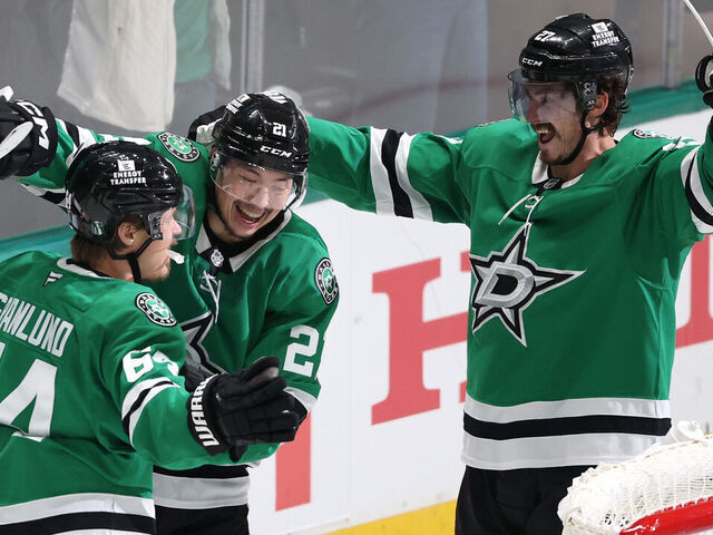 DALLAS, TEXAS - MAY 21: Mikael Granlund #64 of the Dallas Stars congratulated by Jason Robertson #21 and Mason Marchment #27 after scoring a goal against the Edmonton Oilers during the third period in Game One of the Western Conference Final of the 2025 Stanley Cup Playoffs at American Airlines Center on May 21, 2025 in Dallas, Texas.
