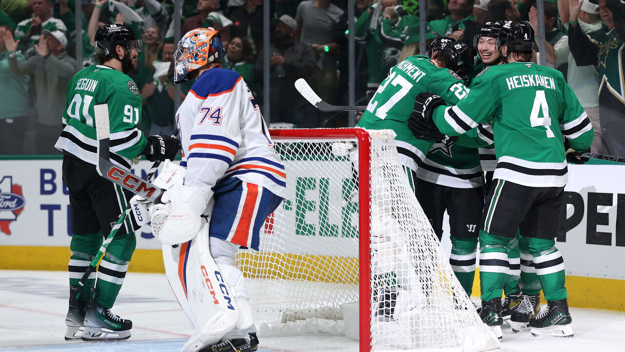 DALLAS, TEXAS - MAY 21: Stuart Skinner #74 of the Edmonton Oilers reacts as Mikael Granlund #64 of the Dallas Stars is congratulated by his teammates after scoring a goal during the third period in Game One of the Western Conference Final of the 2025 Stanley Cup Playoffs at American Airlines Center on May 21, 2025 in Dallas, Texas.