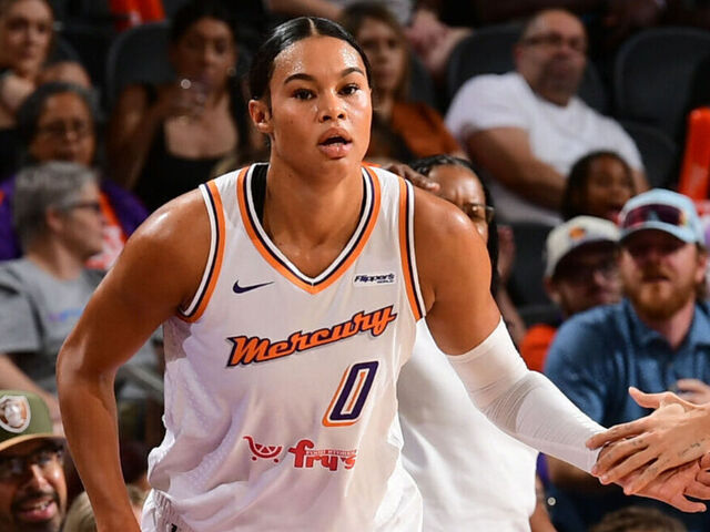 PHOENIX, AZ - MAY 21: Satou Sabally #0 and Sevgi Uzun #10 of the Phoenix Mercury high five during the game against the Los Angeles Sparks on May 21, 2025 at PHX Arena in Phoenix, Arizona. Mandatory Copyright Notice: Copyright 2025 NBAE
