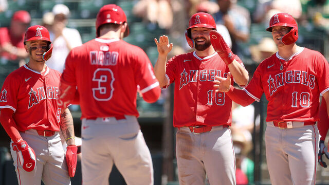 SACRAMENTO, CALIFORNIA - MAY 22: Taylor Ward #3 of the Los Angeles Angels is congratulated by Zach Neto #9, Nolan Schanuel #18 and Kevin Newman #10 after he hit a grand slam home run against the Athletics in the seventh inning at Sutter Health Park on May 22, 2025 in Sacramento, California.