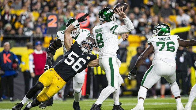PITTSBURGH, PA - OCTOBER 20: Pittsburgh Steelers linebacker Alex Highsmith (56) hits New York Jets quarterback Aaron Rodgers (8) as he throws a pass during the regular season NFL football game between the New York Jets and Pittsburgh Steelers on October 20, 2024 at Acrisure Stadium in Pittsburgh, PA.