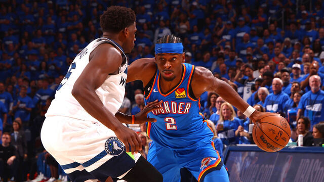 OKLAHOMA CITY, OK - MAY 22: Shai Gilgeous-Alexander #2 of the Oklahoma City Thunder handles the ball while Anthony Edwards #5 of the Minnesota Timberwolves plays defense during the game during Game Two of the Western Conference Finals on May 22, 2025 at Paycom Center in Oklahoma City, Oklahoma. Mandatory Copyright Notice: Copyright 2025 NBAE