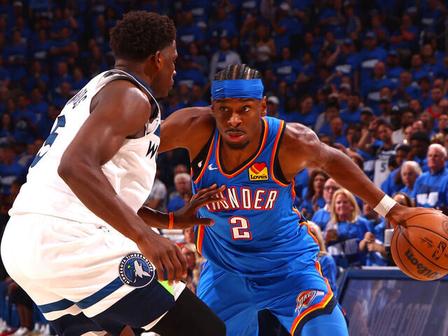 OKLAHOMA CITY, OK - MAY 22: Shai Gilgeous-Alexander #2 of the Oklahoma City Thunder handles the ball while Anthony Edwards #5 of the Minnesota Timberwolves plays defense during the game during Game Two of the Western Conference Finals on May 22, 2025 at Paycom Center in Oklahoma City, Oklahoma. Mandatory Copyright Notice: Copyright 2025 NBAE