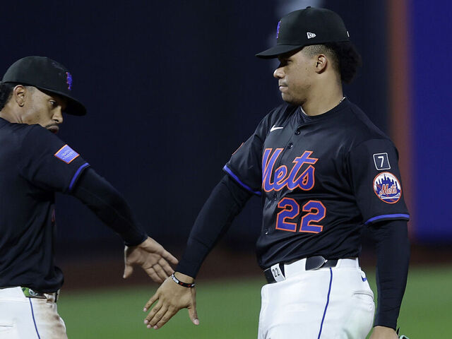 NEW YORK, NEW YORK - MAY 09: Juan Soto #22 and Francisco Lindor #12 of the New York Mets celebrate after defeating the Chicago Cubs at Citi Field on May 09, 2025 in New York City. The Mets defeated the Cubs 7-2.
