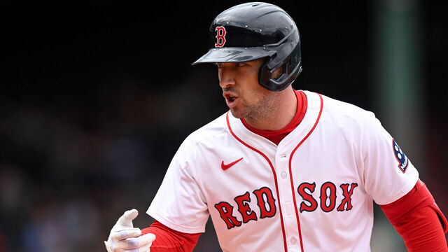 BOSTON, MASSACHUSETTS - MAY 23: Alex Bregman #2 of the Boston Red Sox calls to the dugout for a trainer after hitting a single against the Baltimore Orioles during the fifth inning at Fenway Park on May 23, 2025 in Boston, Massachusetts.