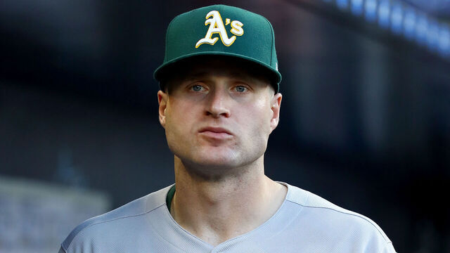 MIAMI, FLORIDA - MAY 2: Seth Brown #15 of the Athletics looks on in the dugout prior to the game against the Miami Marlins at loanDepot park on May 2, 2025 in Miami, Florida.
