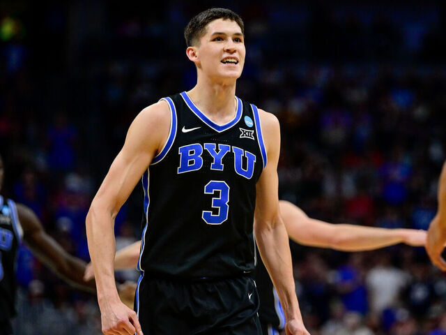 DENVER, COLORADO - MARCH 22: Egor Demin #3 of the Brigham Young Cougars celebrates after a play against the Wisconsin Badgers in the first half in the second round of the NCAA Men's Basketball Tournament at Ball Arena on March 22, 2025 in Denver, Colorado.