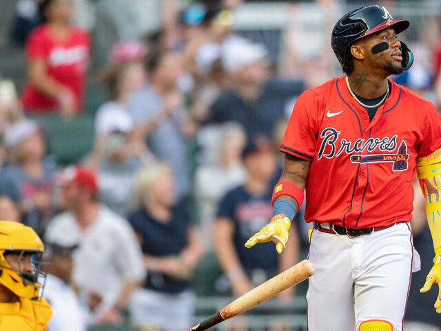 ATLANTA, GA - MAY 23: Ronald Acuña Jr. #13 of the Atlanta Braves hits a solo home run in the first inning during the game between the San Diego Padres and the Atlanta Braves at Truist Park on Friday, May 23, 2025 in Atlanta, Georgia.