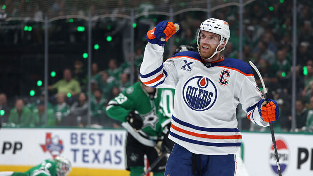 DALLAS, TEXAS - MAY 21: Connor McDavid #97 of the Edmonton Oilers celebrates a goal by teammate Leon Draisaitl (not pictured) against the Dallas Stars during the first period in Game One of the Western Conference Final of the 2025 Stanley Cup Playoffs at American Airlines Center on May 21, 2025 in Dallas, Texas.