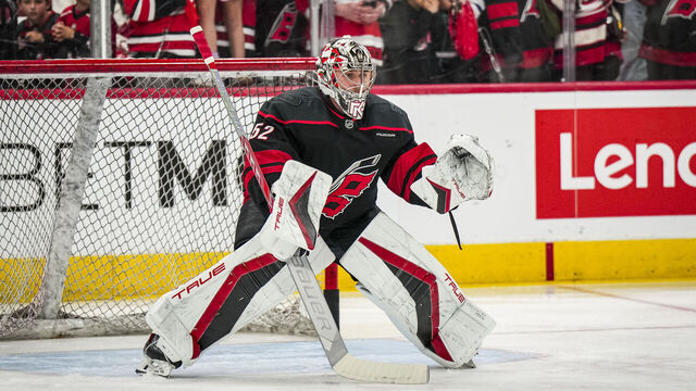 RALEIGH, NORTH CAROLINA - APRIL 29: Pyotr Kochetkov #52 of the Carolina Hurricanes warms up before the game against the New Jersey Devils of Game Five of the First Round of the 2025 Stanley Cup Playoffs at Lenovo Center on April 29, 2025 in Raleigh, North Carolina.