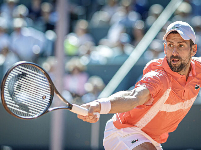 Serbia's Novak Djokovic returns a ball to Poland's Hubert Hurkacz during their men's singles final match at the ATP 250 Geneva Open tennis tournament in Geneva on May 24, 2025.