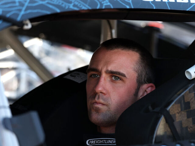 NORTH WILKESBORO, NORTH CAROLINA - MAY 17: Austin Cindric, driver of the #2 Freightliner Ford, looks on in his car during the NASCAR Cup Series All-Star Race qualifying heat #2 at North Wilkesboro Speedway on May 17, 2025 in North Wilkesboro, North Carolina.