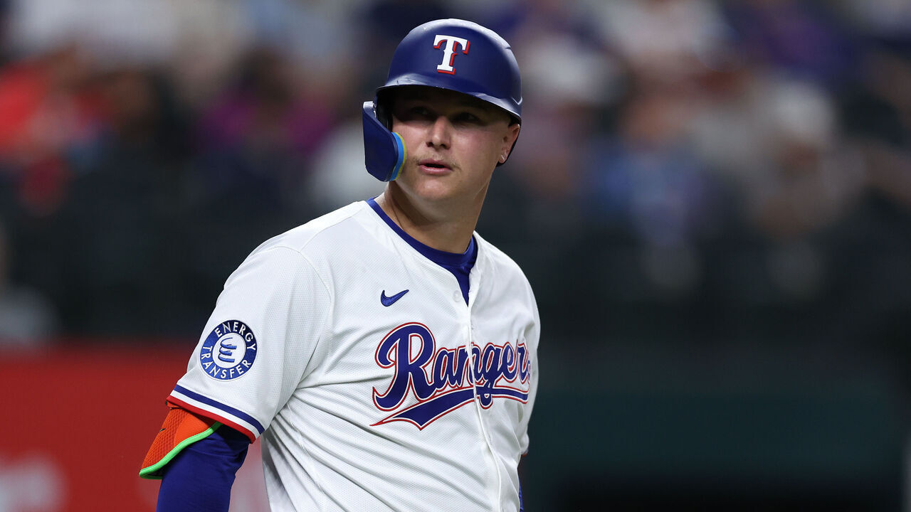 ARLINGTON, TEXAS - MAY 14: Joc Pederson #4 of the Texas Rangers look on during the fourth inning against the Colorado Rockies at Globe Life Field on May 14, 2025 in Arlington, Texas.
