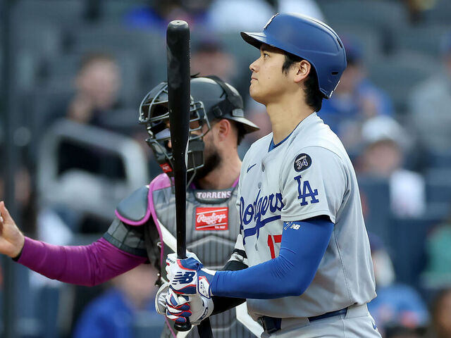 NEW YORK, NEW YORK - MAY 24: Shohei Ohtani #17 of the Los Angeles Dodgers reacts after striking out in the first inning as Luis Torrens #13 of the New York Mets defends at Citi Field on May 24, 2025 in the Flushing neighborhood of the Queens borough of New York City.