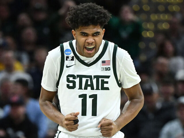 CLEVELAND, OHIO - MARCH 21: Jase Richardson #11 of the Michigan State Spartans celebrates after his three-point basket against the Bryant University Bulldogs during the second half in the first round of the NCAA Men's Basketball Tournament at Rocket Mortgage Fieldhouse on March 21, 2025 in Cleveland, Ohio.