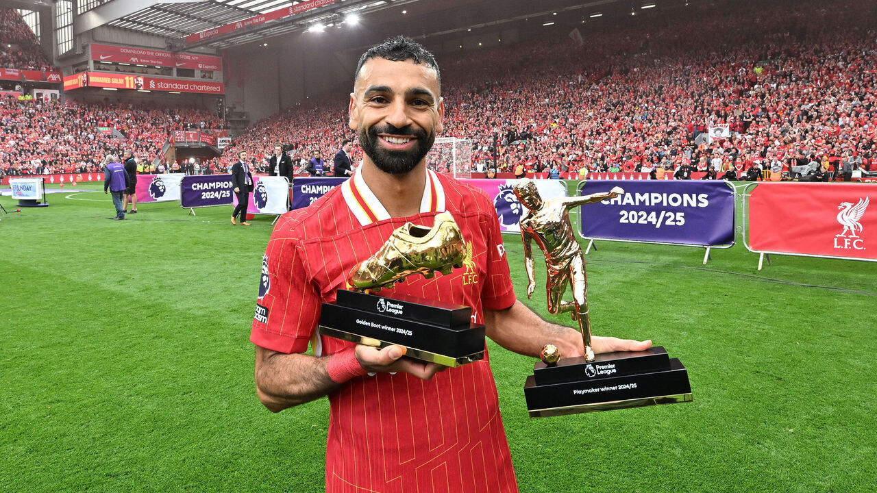 LIVERPOOL, ENGLAND - MAY 25: (THE SUN OUT. THE SUN ON SUNDAY OUT) Mohamed Salah of Liverpool poses for a photo with his Premier League Golden boot and Playmakers award after the teams 1-1 draw in the Premier League match between Liverpool FC and Crystal Palace FC at Anfield on May 25, 2025 in Liverpool, England.