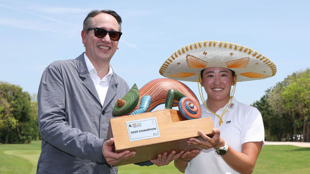 PLAYA DEL CARMEN, MEXICO - MAY 25: (L-R) Luis Durán Luján and Chisato Iwai of Japan pose with the trophy after the final round of the Riviera Maya Open at Mayakoba 2025 at El Camaleon at Mayakoba on May 25, 2025 in Playa del Carmen, Mexico.