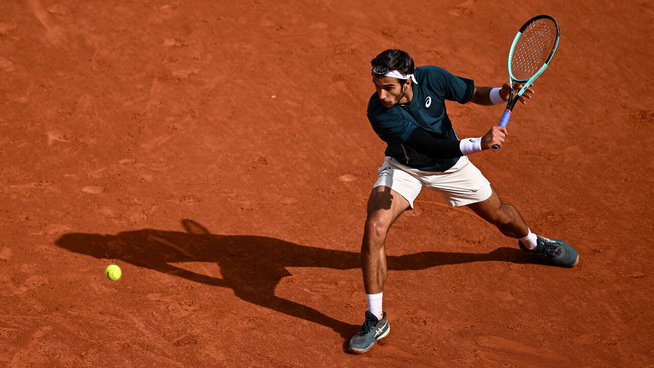 PARIS, FRANCE - MAY 25: Lorenzo Musetti of Italy in action against Yannick Hanfmann of Germany during the Men's Singles First Round match on Day One of the 2025 French Open at Roland Garros on May 25, 2025 in Paris, France.