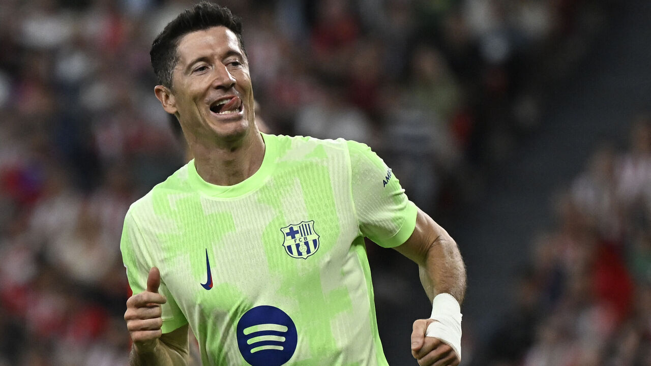 Barcelona's Polish forward #09 Robert Lewandowski celebrates scoring his second goal during the Spanish league football match between Athletic Club Bilbao and FC Barcelona at San Mames Stadium in Bilbao, on May 25, 2025.