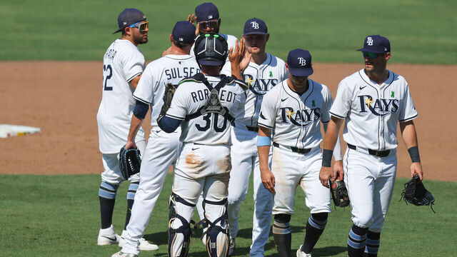 TAMPA, FL - MAY 25: Members of the Tampa Bay Rays celebrate after defeating the Toronto Blue Jays at George M. Steinbrenner Field on Sunday, May 25, 2025 in Tampa, Florida.