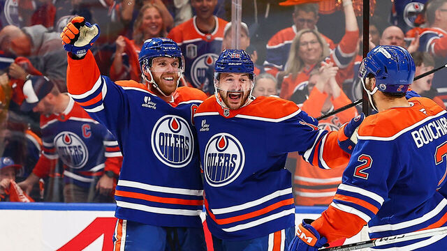 EDMONTON, AB - MAY 25: Edmonton Oilers Center Connor McDavid (97) celebrates his goal with Edmonton Oilers Right Wing Zach Hyman (18) in the first period of game three of Stanley Cup Playoffs Conference Final Edmonton Oilers game versus the Dallas Stars on May 25, 2025 at Rogers Place in Edmonton, AB.