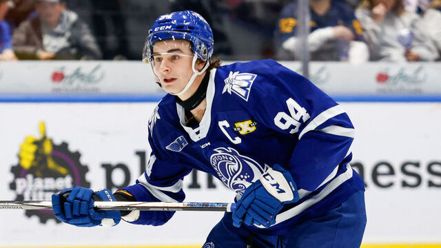 SAGINAW, MI - NOVEMBER 30: Porter Martone #94 of Brampton skates for the puck during a game between Brampton Steelheads and Saginaw Spirit at Dow Event Center on November 30, 2024 in Saginaw, Michigan.