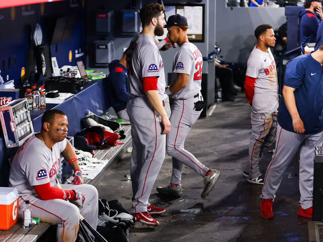 TORONTO, CANADA - APRIL 30: Rafael Devers #11 of the Boston Red Sox sits in the dugout during their MLB game against the Toronto Blue Jays at Rogers Centre on April 30, 2025 in Toronto, Ontario, Canada.
