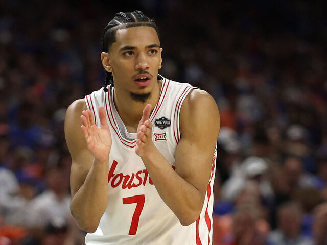 SAN ANTONIO, TEXAS - APRIL 07: Milos Uzan #7 of the Houston Cougars reacts during the first half in the National Championship of the NCAA Men's Basketball Tournament against the Florida Gators at the Alamodome on April 07, 2025 in San Antonio, Texas.
