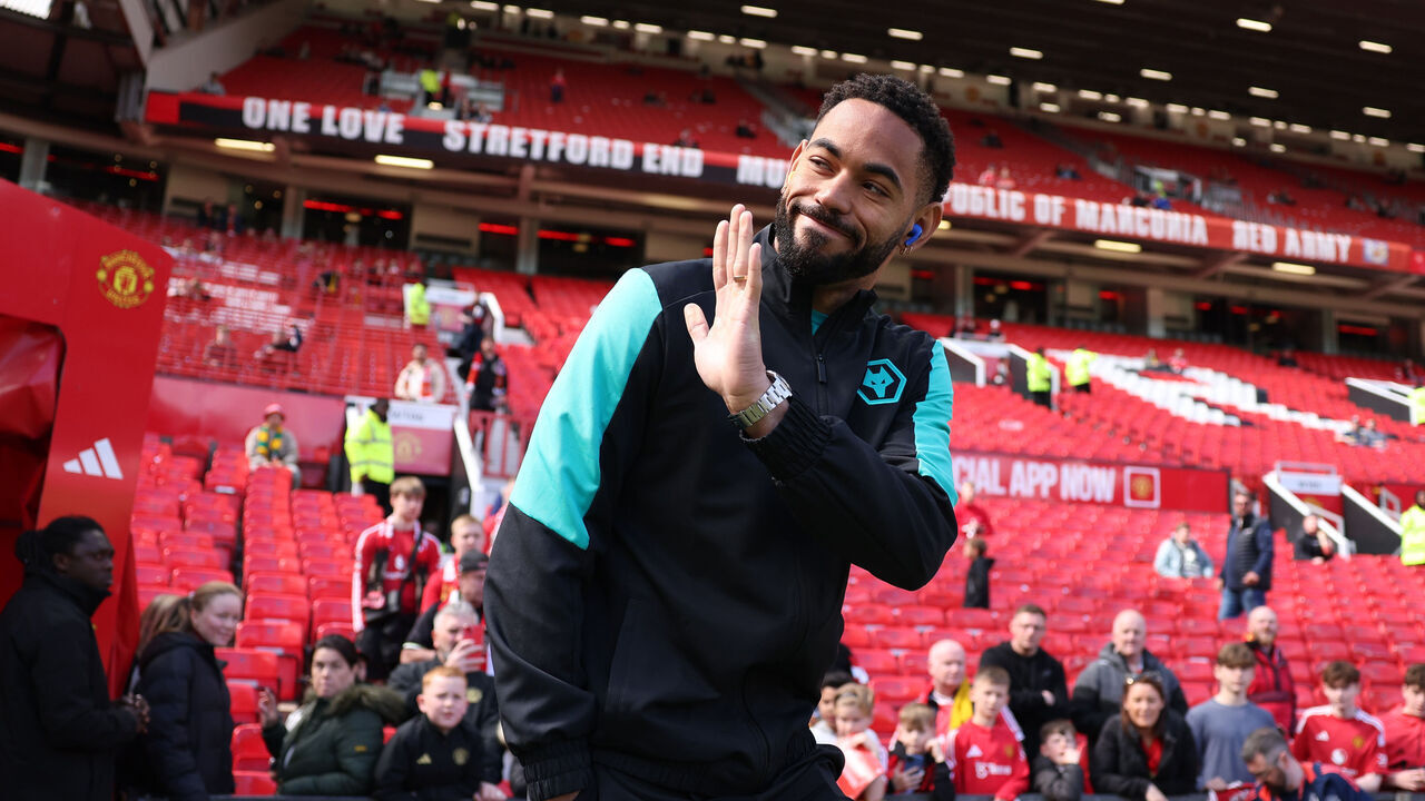 MANCHESTER, ENGLAND - APRIL 20: Matheus Cunha of Wolverhampton Wanderers acknowledges the fans as he inspects the pitch prior to the Premier League match between Manchester United FC and Wolverhampton Wanderers FC at Old Trafford on April 20, 2025 in Manchester, England.