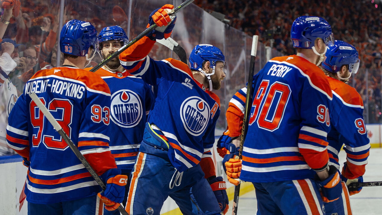 EDMONTON, CANADA - MAY 27: Leon Draisaitl #29, Connor McDavid #97, Ryan Nugent-Hopkins #93, Evan Bouchard #2 and Corey Perry #90 of the Edmonton Oilers celebrate a first-period goal against the Dallas Stars during Game Four of the Western Conference Finals of the 2025 Stanley Cup Playoffs at Rogers Place on May 27, 2025, in Edmonton, Alberta, Canada.