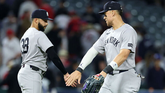 ANAHEIM, CALIFORNIA - MAY 27: Devin Williams #38 and Aaron Judge #99 of the New York Yankees celebrate after defeating the Los Angeles Angels 3-2 in a game at Angel Stadium of Anaheim on May 27, 2025 in Anaheim, California.