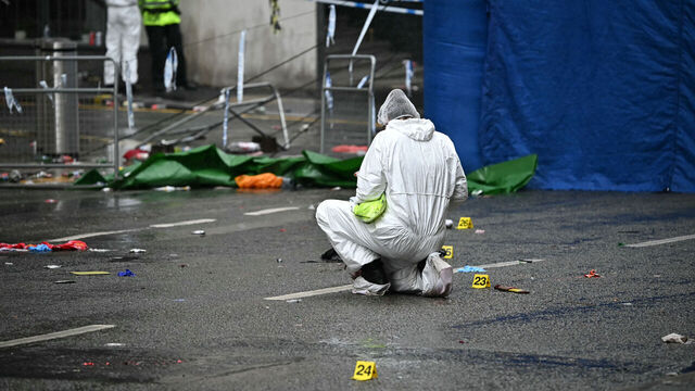 A police forensic officer works at the scene on Water Street in Liverpool, north-west England on May 27, 2025, where a car ploughed in to crowds that had gathered on May 26 to watch an open-top bus victory parade for Liverpool's Premier League trophy parade. Police said Monday they were not treating a Liverpool car ramming which left 27 people hospitalised as terrorism, after a vehicle ploughed into crowds celebrating Liverpool's Premier League football title. "We believe this to be an isolated incident, and we are not currently looking for anyone else in relation to it," Merseyside Police Assistant Chief Constable Jenny Sims told a press conference, adding a 53-year-old British man had been arrested.