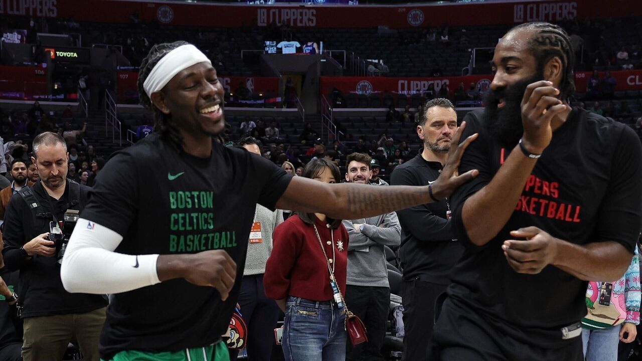 LOS ANGELES, CA - DECEMBER 23: Jrue Holiday #4 of the Boston Celtics talks to James Harden #1 of the LA Clippers before the game on December 23, 2023 at Crypto.Com Arena in Los Angeles, California. NOTE TO USER: User expressly acknowledges and agrees that, by downloading and/or using this Photograph, user is consenting to the terms and conditions of the Getty Images License Agreement. Mandatory Copyright Notice: Copyright 2023 NBAE