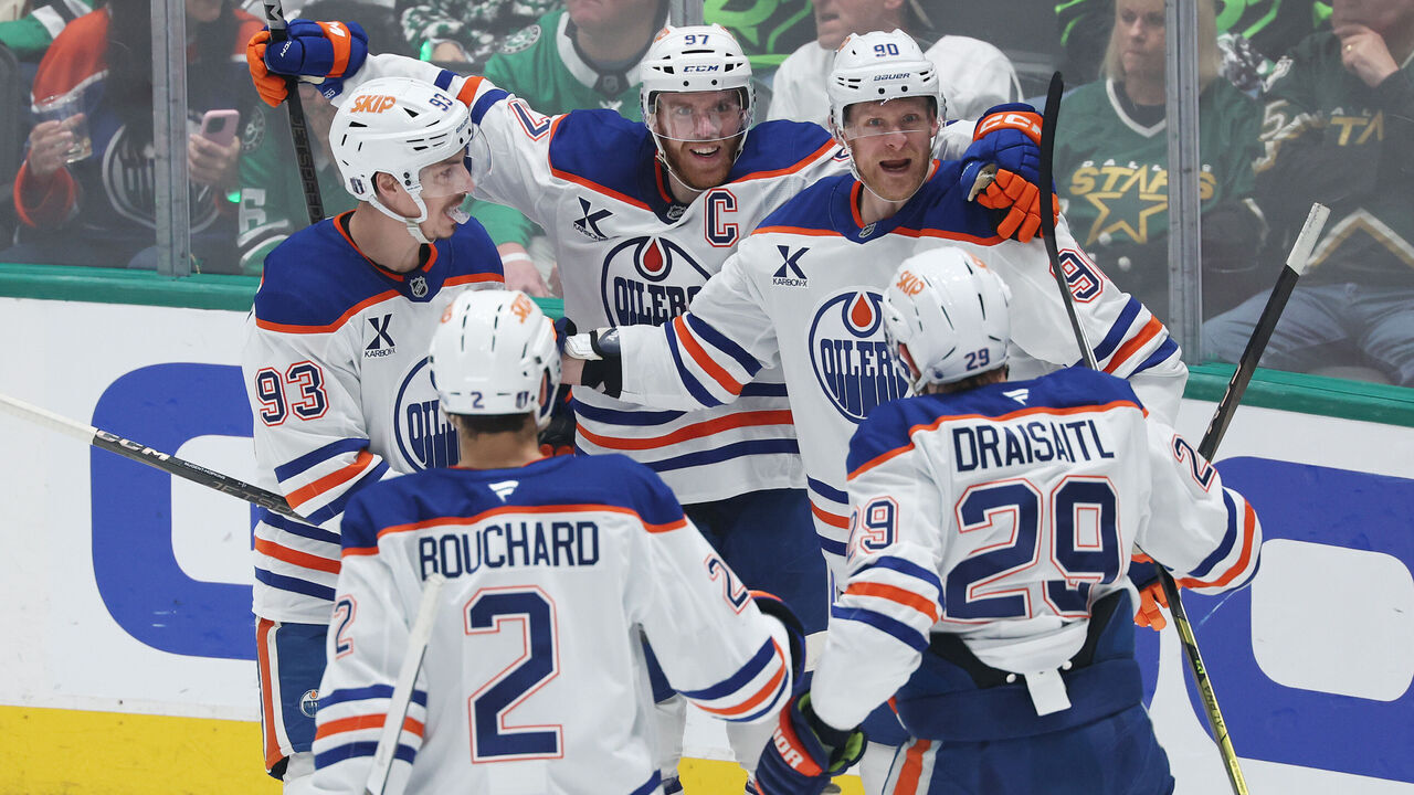 DALLAS, TEXAS - MAY 29: Corey Perry #90 of the Edmonton Oilers celebrates with Connor McDavid #97, Ryan Nugent-Hopkins #93, Evan Bouchard #2 and Leon Draisaitl #29 after scoring a goal against Jake Oettinger #29 of the Dallas Stars during the first period in Game Five of the Western Conference Final of the 2025 Stanley Cup Playoffs at American Airlines Center on May 29, 2025 in Dallas, Texas.