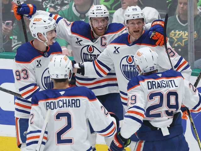DALLAS, TEXAS - MAY 29: Corey Perry #90 of the Edmonton Oilers celebrates with Connor McDavid #97, Ryan Nugent-Hopkins #93, Evan Bouchard #2 and Leon Draisaitl #29 after scoring a goal against Jake Oettinger #29 of the Dallas Stars during the first period in Game Five of the Western Conference Final of the 2025 Stanley Cup Playoffs at American Airlines Center on May 29, 2025 in Dallas, Texas.