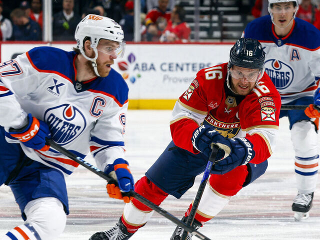 SUNRISE, FL - FEBRUARY 27: Aleksander Barkov #16 of the Florida Panthers defends against Connor McDavid #97 of the Edmonton Oilers during first period action at the Amerant Bank Arena on February 27, 2025 in Sunrise, Florida.