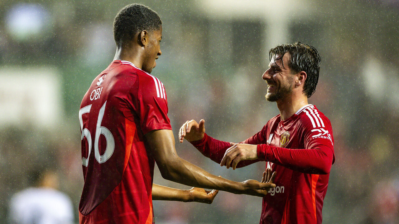 HONG KONG, CHINA - MAY 30: Chido Obi of Manchester United (L) celebrates after scoring his 2nd goal with Mason Mount of Manchester United (R) during the match between Manchester United and Hong Kong at Hong Kong Stadium on May 30, 2025 in Hong Kong, China.