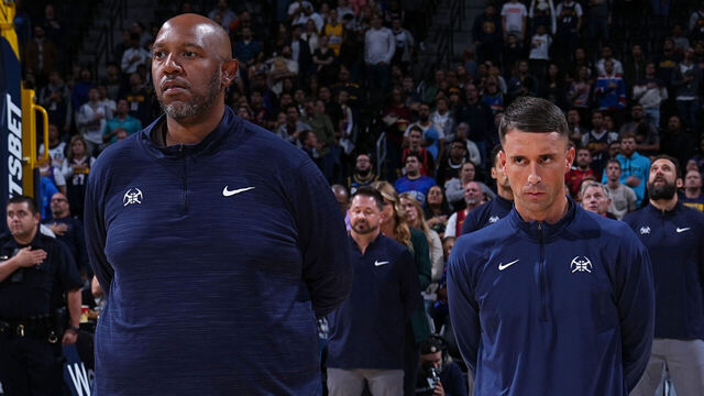 DENVER, CO - OCTOBER 10: Assistant Coaches Popeye Jones, Ryan Saunders, David Adelman, and Head Coach Michael Malone of the Denver Nuggets stand for the National Anthem before a preseason game against the Phoenix Suns on October 10, 2022 at the Ball Arena in Denver, Colorado. NOTE TO USER: User expressly acknowledges and agrees that, by downloading and/or using this Photograph, user is consenting to the terms and conditions of the Getty Images License Agreement. Mandatory Copyright Notice: Copyright 2022 NBAE