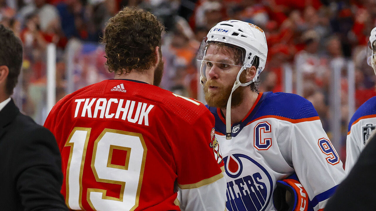SUNRISE, FL - JUNE 24: Connor McDavid #97 of the Edmonton Oilers and Matthew Tkachuk #19 of the Florida Panthers meet at center ice after Game Seven of the Final of the 2024 Stanley Cup Playoffs at the Amerant Bank Arena on June 24, 2024 in Sunrise, Florida.