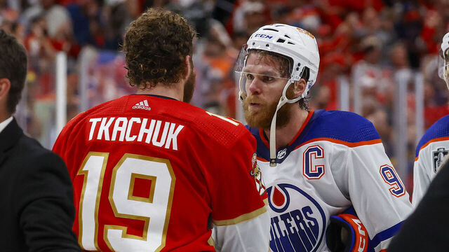 SUNRISE, FL - JUNE 24: Connor McDavid #97 of the Edmonton Oilers and Matthew Tkachuk #19 of the Florida Panthers meet at center ice after Game Seven of the Final of the 2024 Stanley Cup Playoffs at the Amerant Bank Arena on June 24, 2024 in Sunrise, Florida.