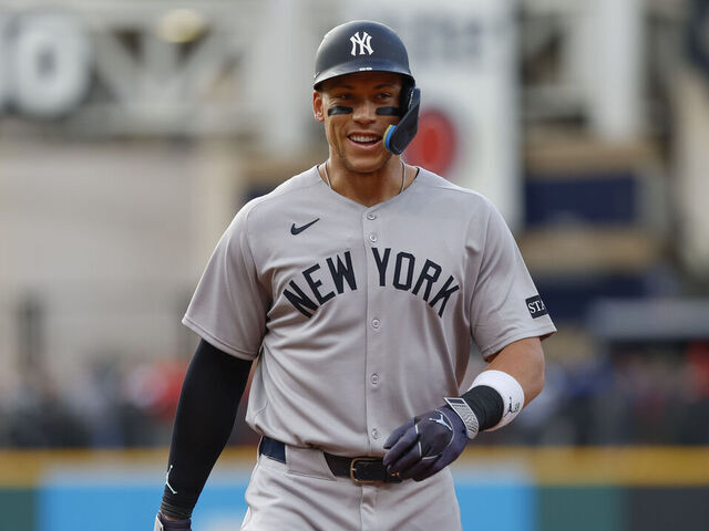 CLEVELAND, OHIO - APRIL 21: Aaron Judge #99 of the New York Yankees smiles in the first inning during a game against the Cleveland Guardians at Progressive Field on April 21, 2025 in Cleveland, Ohio.