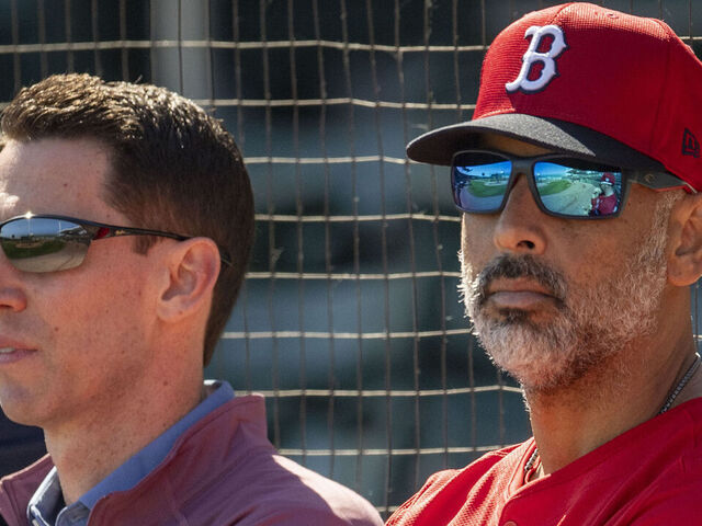 FT. MYERS, FLORIDA - FEBRUARY 15: Chief Baseball Officer Craig Breslow and manager Alex Cora of the Boston Red Sox look on during a spring training team workout on February 15, 2024 at jetBlue Park at Fenway South in Fort Myers, Florida.