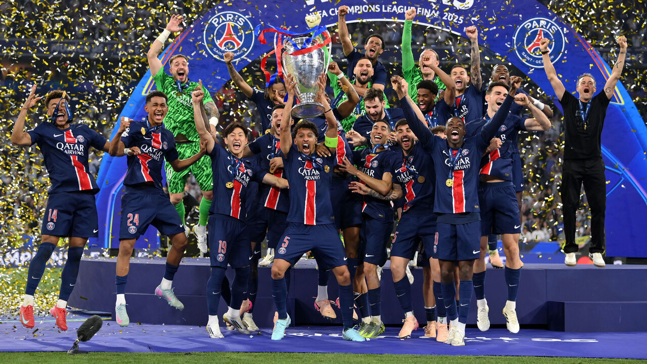 MUNICH, GERMANY - MAY 31: Marquinhos of Paris Saint-Germain lifts the UEFA Champions League trophy after his team's victory, to secure Paris Saint-Germain's first ever UEFA Champions League title in the club's history and a record UEFA Champions League Final winning scoreline of 5-0, following the UEFA Champions League Final 2025 between Paris Saint-Germain and FC Internazionale Milano at Munich Football Arena on May 31, 2025 in Munich, Germany.