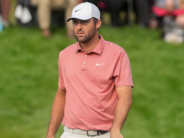 DUBLIN, OH - MAY 31: Scottie Scheffler of the United States looks on while waiting to put on the 14th green during the third round of the Memorial Tournament on May 31, 2025 at Muirfield Village Golf Club in Dublin, Ohio.