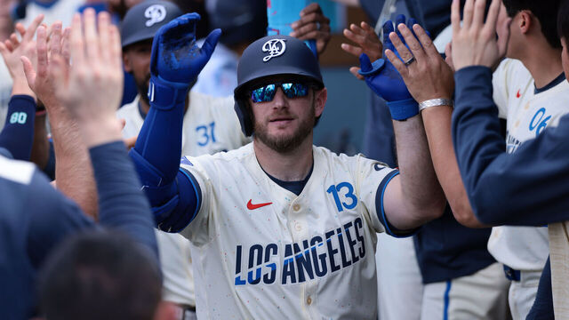 LOS ANGELES, CA - MAY 31: Max Muncy #13 of the Los Angeles Dodgers celebrates in the dugout after hitting a three-run home run in the bottom of the second inning during the game between the New York Yankees and the Los Angeles Dodgers at Dodger Stadium on Saturday, May 31, 2025 in Los Angeles, California.