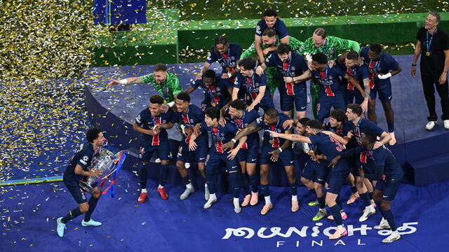 MUNICH, GERMANY - MAY 31: Paris Saint-Germain (PSG)'s players lift the trophy to celebrate their victory at the end of the UEFA Champions League final football match between Paris Saint-Germain (PSG) and Inter Milan, at Munich Football Arena in Munich, Germany on May 31, 2025.
