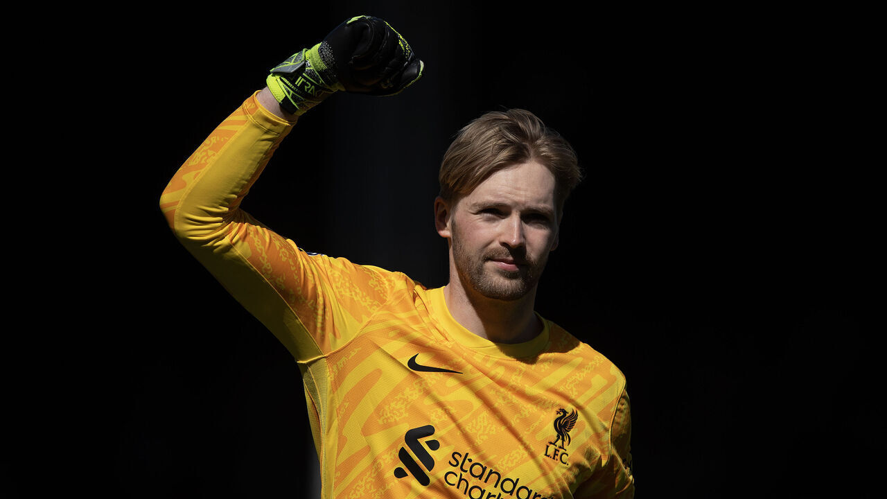 LONDON, ENGLAND - APRIL 06: Caoimhin Kelleher of Liverpool FC celebrates Liverpool's first goal during the Premier League match between Fulham FC and Liverpool FC at Craven Cottage on April 06, 2025 in London, England.